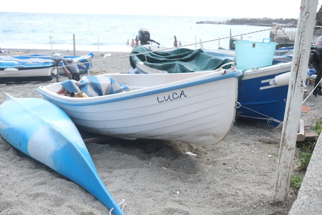 Boating ropes and nautical equipment on a wooden dock.