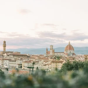 Aerial view of Florence, Italy with the Duomo at sunset.