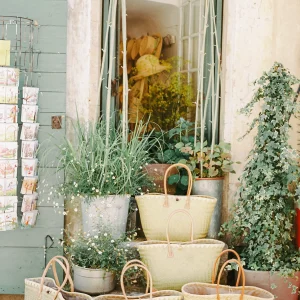 French storefront with baskets and herbs – rustic Provence travel print, charming wall decor.