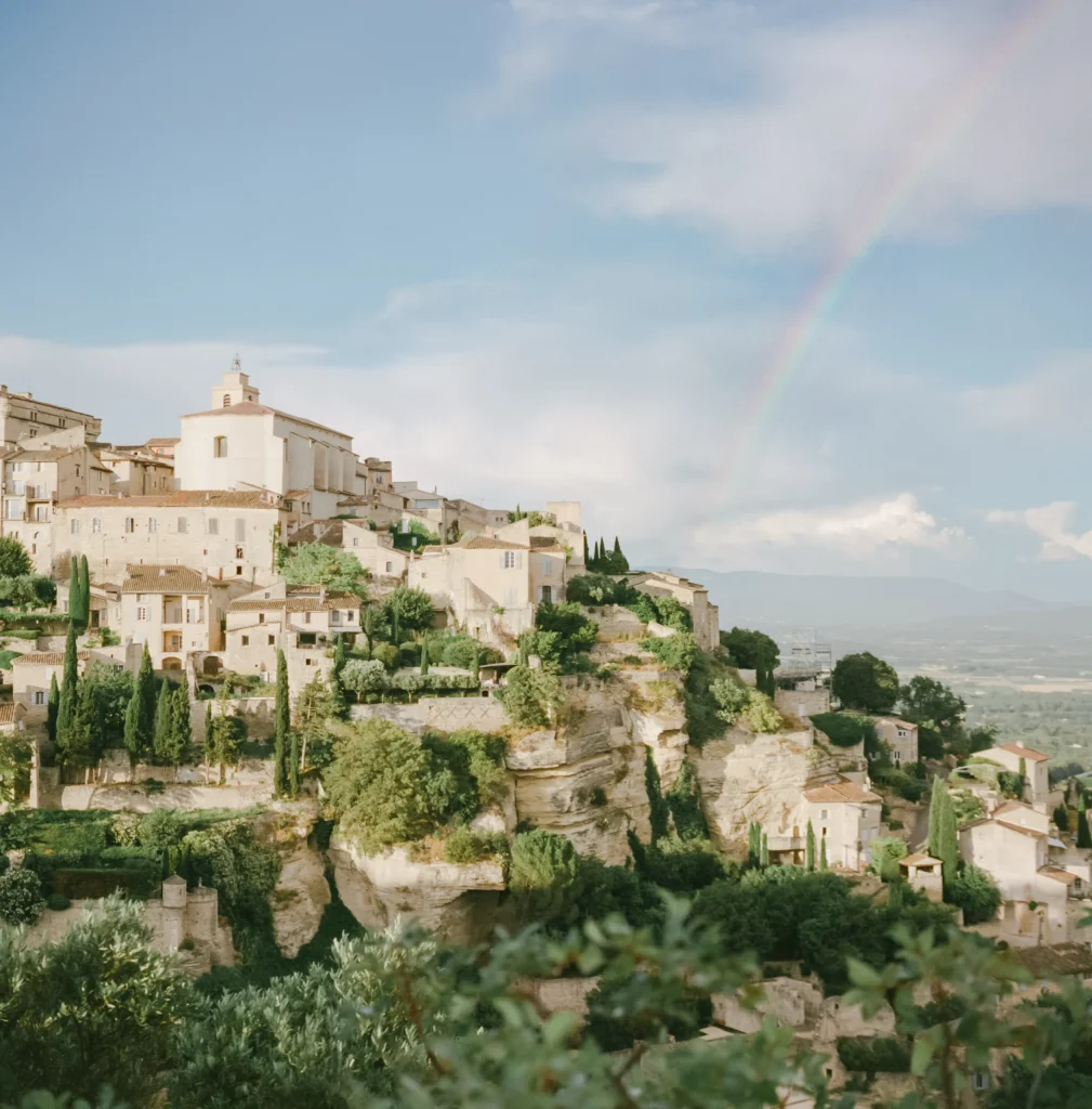 Hilltop village in Provence under rainbow – iconic France landscape art print, European travel photo.