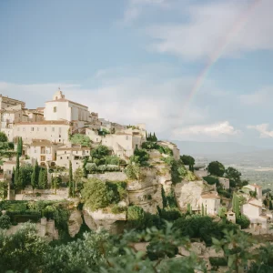 Hilltop village in Provence under rainbow – iconic France landscape art print, European travel photo.